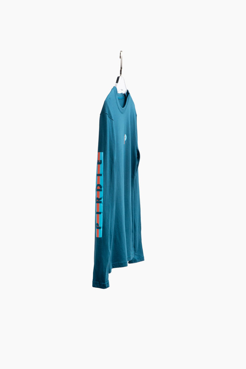Load image into Gallery viewer, Pirdie longsleeve golf t-shirt in teal on hanger..
