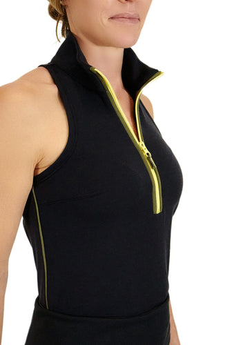 Model wearing Black Back Nine womens golf sleeveless shirt with yellow zipper and olive accents