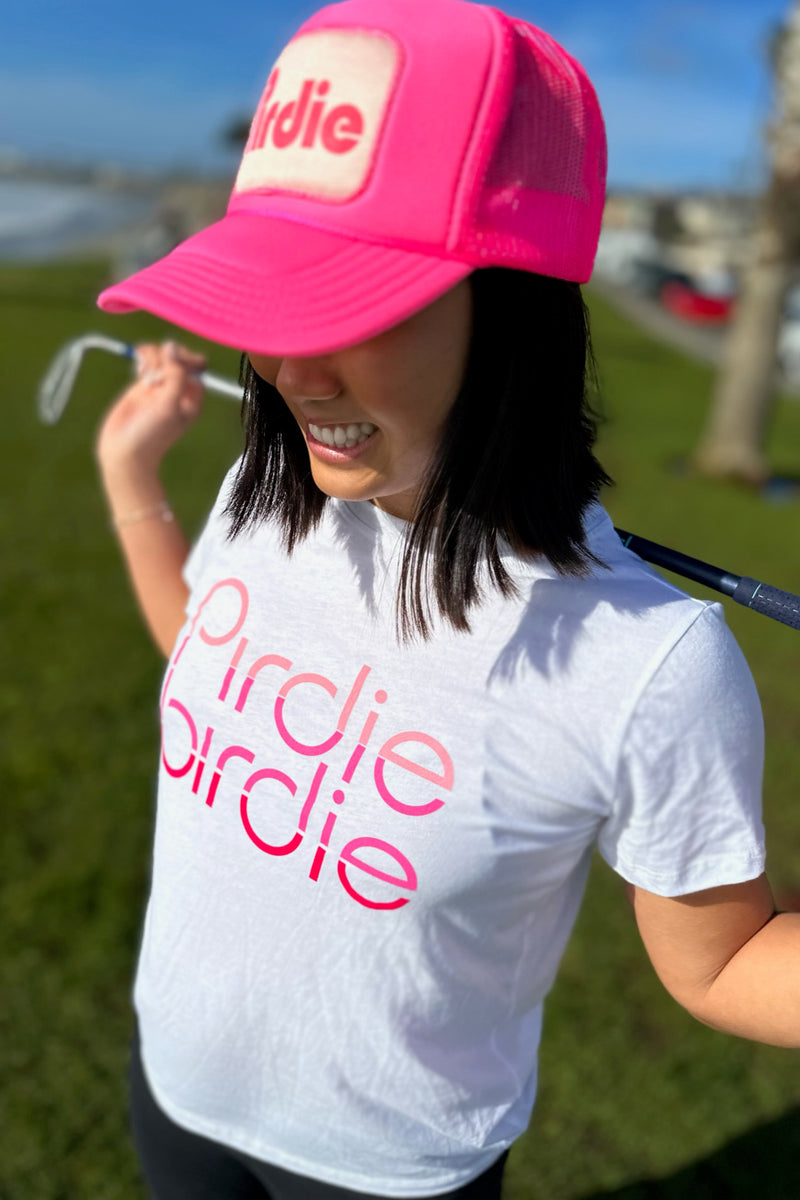 Load image into Gallery viewer, Model wearing Pirdie Birdie golf t-shirt and Pirdie golf trucker hat.
