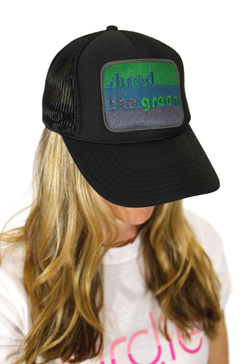 Load image into Gallery viewer, Model wearing black shred the green golf trucker hat
